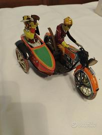 Giocattolo in latta moto con sidecar
