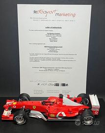 ferrari f2003 firmata a mano da Michael Schumacher