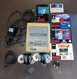 Super Nintendo usata + 4 videogiochi