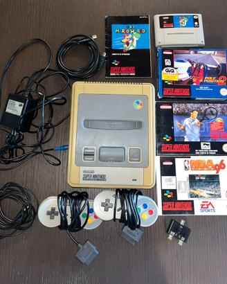 Super Nintendo usata + 4 videogiochi
