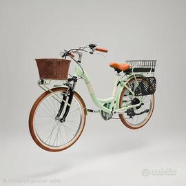 Bici elettrica con accessori seggiolino e cestino