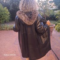 Cappotto vera pelle con cappuccio bordato pellicci