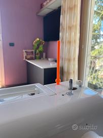 Supporto seconda spoletta per macchina Singer