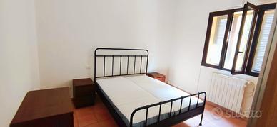Bilocale con balcone e giardino condominiale