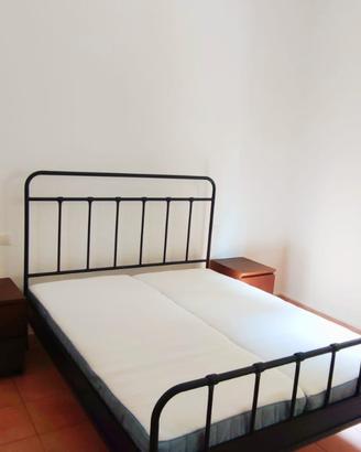Bilocale con balcone e giardino condominiale