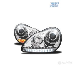FARI PORSCHE CAYENNE 03-07 LUCE DIURNA FONDO CROMA