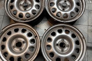 4 cerchioni in ferro originali golf da 15