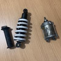 Motorino di avviamento, sospensione posteriore etc