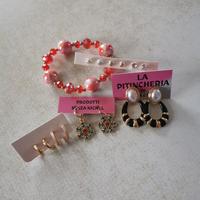 7 paia orecchini e 1 bracciale 