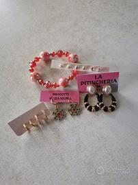 7 paia orecchini e 1 bracciale 