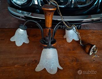 Lampadario in legno e ferro battuto 