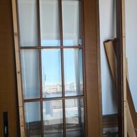 Porta scorrevole con vetri