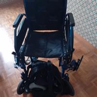 carrozzina per disabili a motore