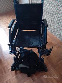 carrozzina per disabili a motore