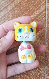 Gatto in ceramica con testa dondolante