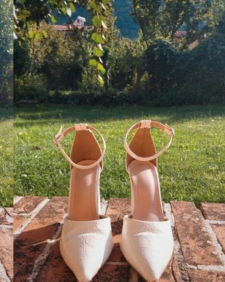 Scarpe bianche con tacco