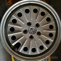 Cerchi in lega 15" originali ALFA ROMEO 75 - 164