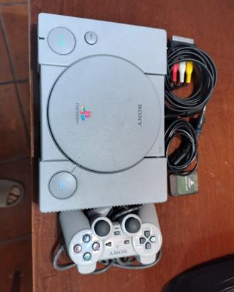 Console PlayStation 1 e custodia a tracolla  
