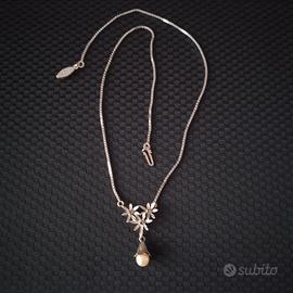Collana in oro bianco 18k con smeraldi e perla