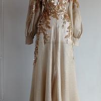 Abito jacquard oro con paillettes