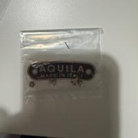 Targhetta aquila made in italy per sella vespa