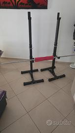 Set panca, rack, bilanciere e pesi