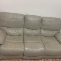 Divano in pelle con movimento apertura due sedute