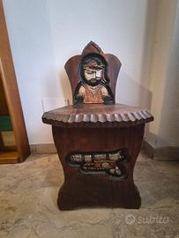 sedia scolpita a mano contenitore