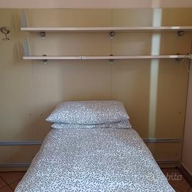 Parete con letti scorrevoli