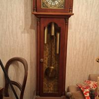 orologio a pendolo con base