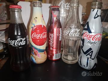 piccola collezione di bottiglie coca cola anni 90