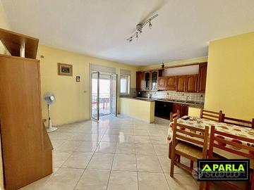 appartamento con giardino ed ampio garage.