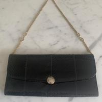 Elegante pochette vintage anni '70 in pelle