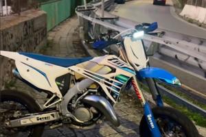 TM 125