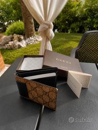 Portafogli GUCCI bi-fold GG in pelle
