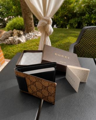 Portafogli GUCCI bi-fold GG in pelle
