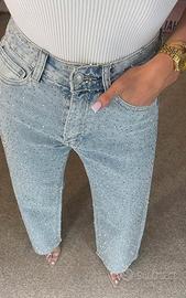 Jeans denim glitterati con strass