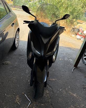 Xmax .