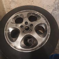 4 cerchi in lega alfa 147 con gomme usurate
