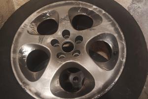 4 cerchi in lega alfa 147 con gomme usurate
