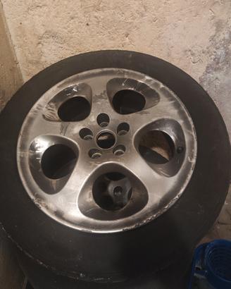 4 cerchi in lega alfa 147 con gomme usurate