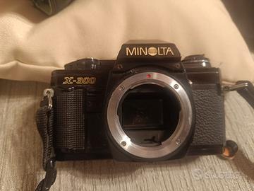 Macchina  vintage Minolta X-300 + obiettivi