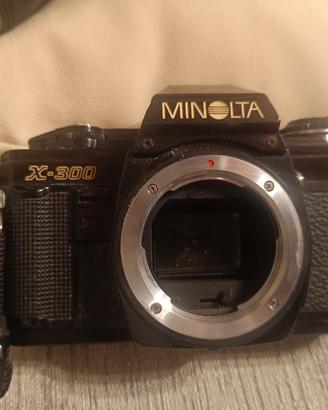 Macchina  vintage Minolta X-300 + obiettivi