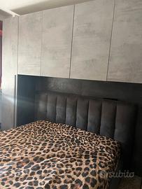 Camera da letto con letto contenitore matrimoniale