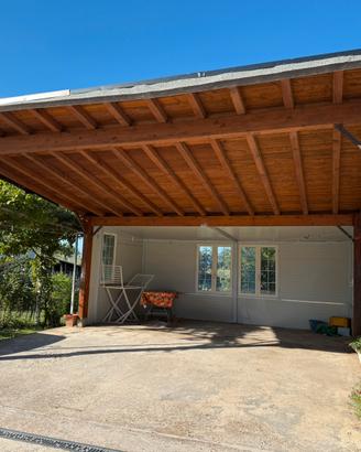 Tettoia in legno con termocopertura + casotto
