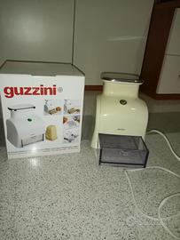 Grattugia Guzzini. 