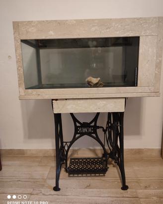 ex acquario rivestito in marmo perlato