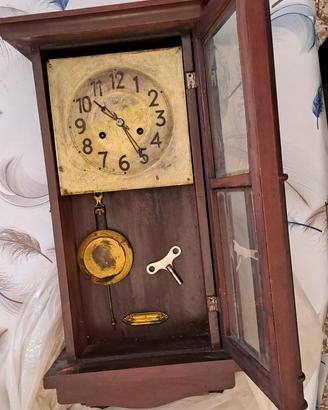 orologio a pendolo antico