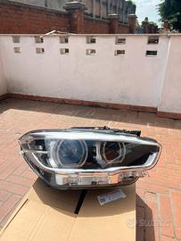 BMW serie 1 F20 faro anteriore lato passegero