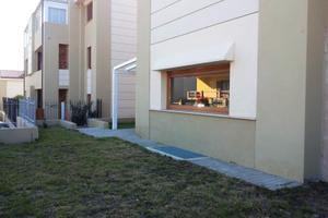 Soluzione su due livelli con giardino